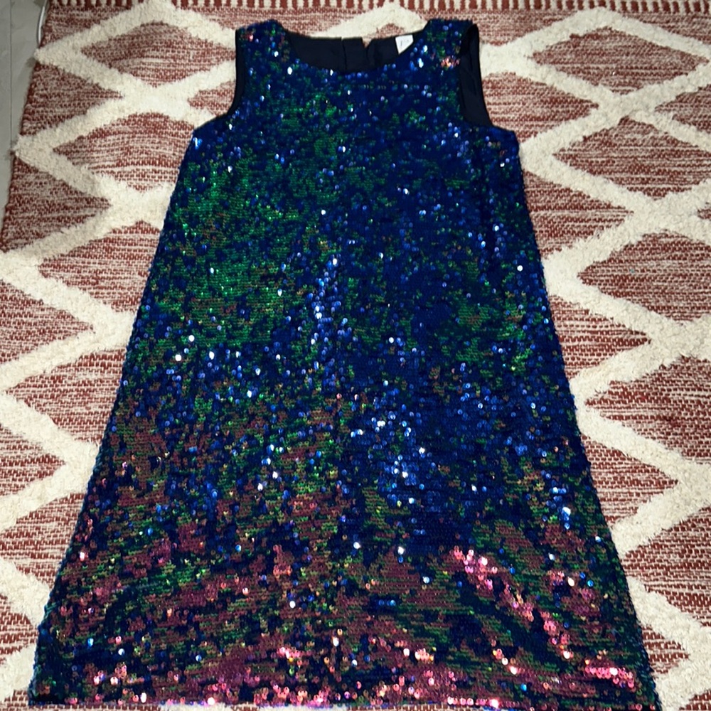 Brand new dress,short but not mini perfect for a graduation or a formal dress